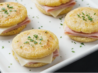 Arepa (corn tart) stuffed with ham and Swiss