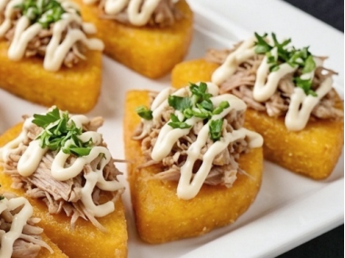 Corn "tortilla" topped with pork tenderloin